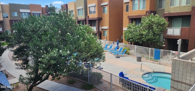 view of swimming pool featuring a patio