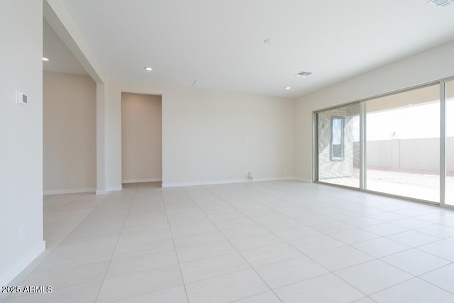 view of tiled spare room