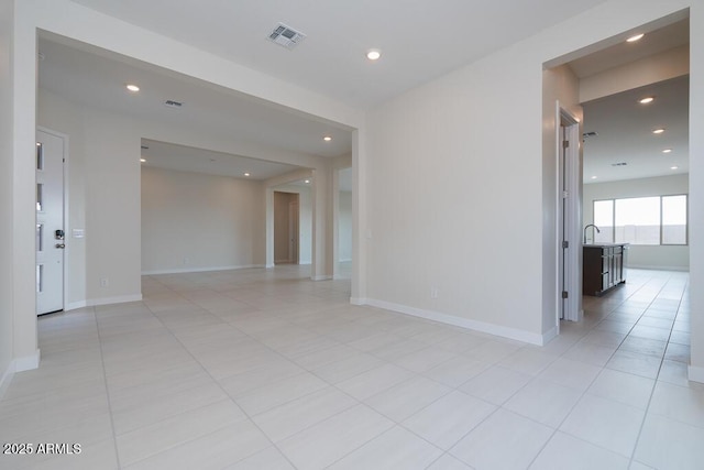 view of tiled spare room