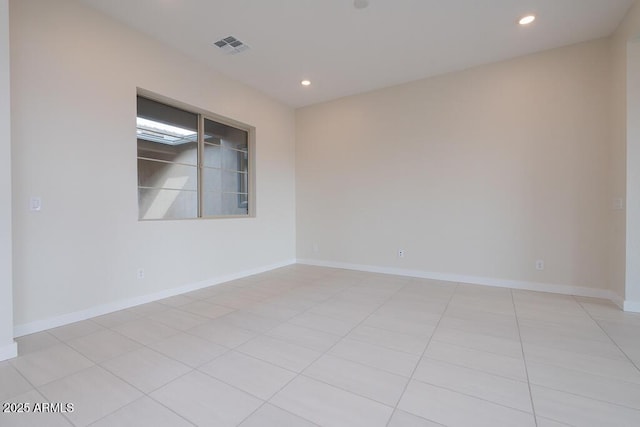 view of tiled spare room