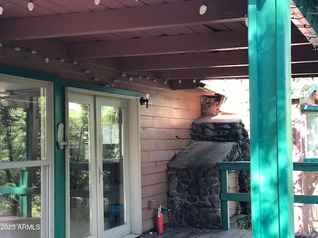 view of exterior entry featuring french doors