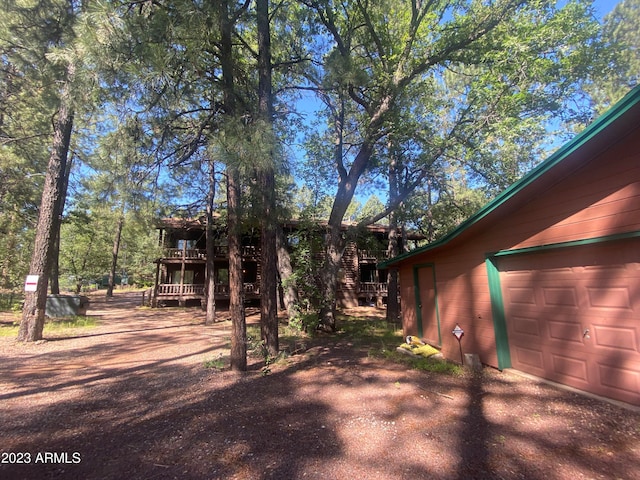 view of yard with a garage