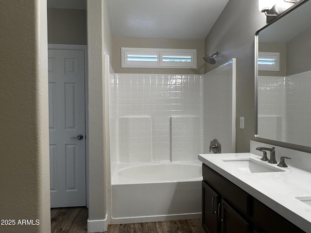 351 N Newport St, Chandler, AZ 85225 - full bath featuring bathtub / shower combination, wood finished floors, double vanity, and a textured wall