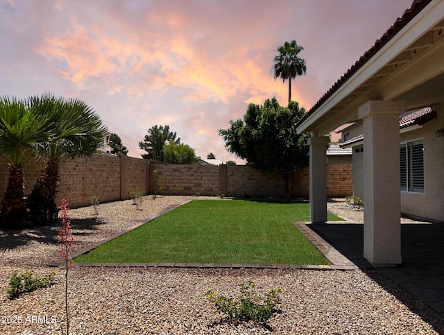 351 N Newport St, Chandler, AZ 85225 - yard at dusk featuring a fenced backyard and a patio area