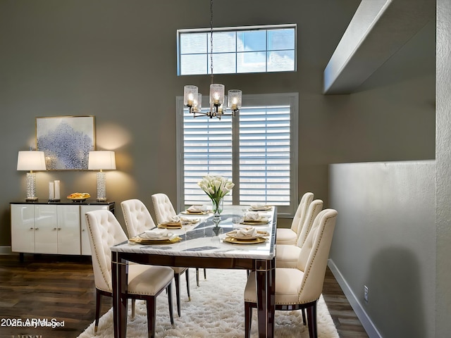 351 N Newport St, Chandler, AZ 85225 - dining area featuring a chandelier, wood finished floors, and a towering ceiling