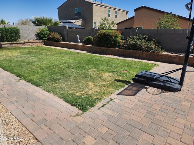 7251 E Grouse Ct, San Tan Valley, AZ 85143 - view of yard featuring a fenced backyard and a patio area