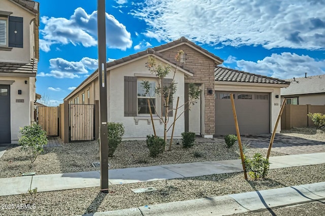 view of front of home with a garage