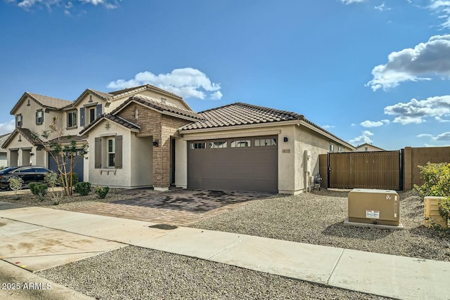 view of front of property with a garage