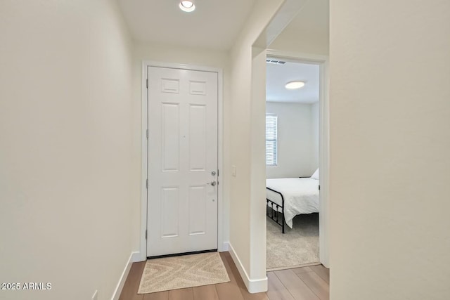 doorway featuring light hardwood / wood-style floors