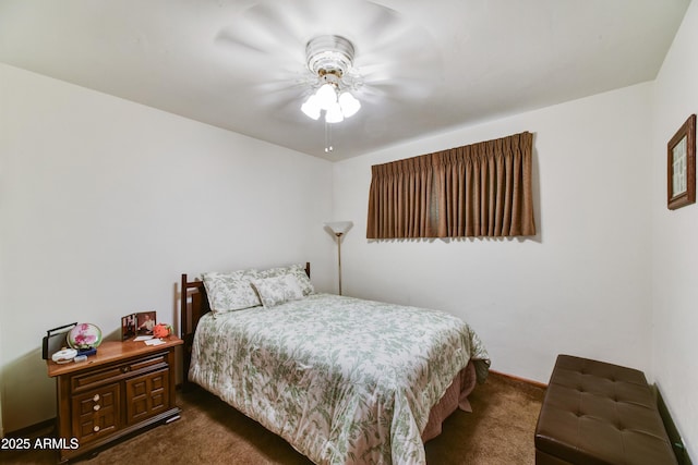 bedroom featuring a ceiling fan and dark colored carpet