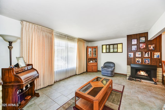 living area featuring a large fireplace