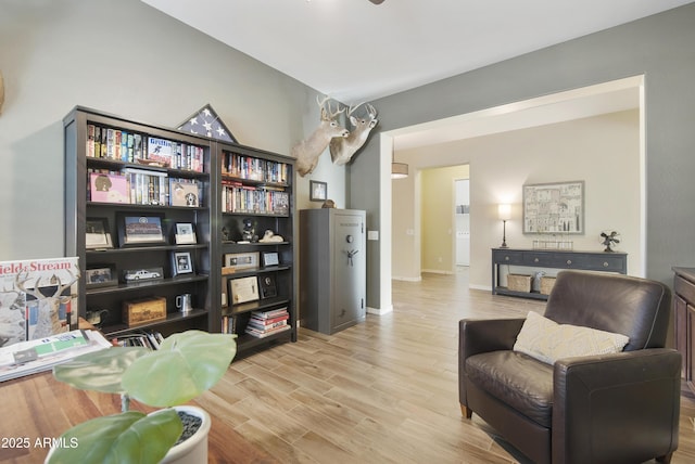 sitting room featuring wood finished floors and baseboards