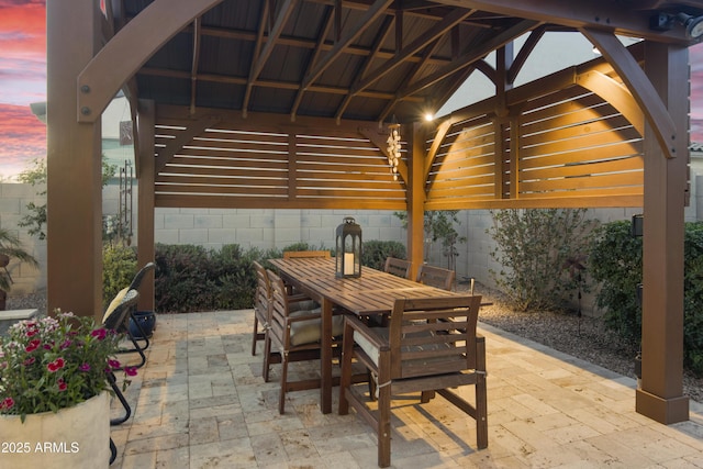 view of patio featuring outdoor dining area