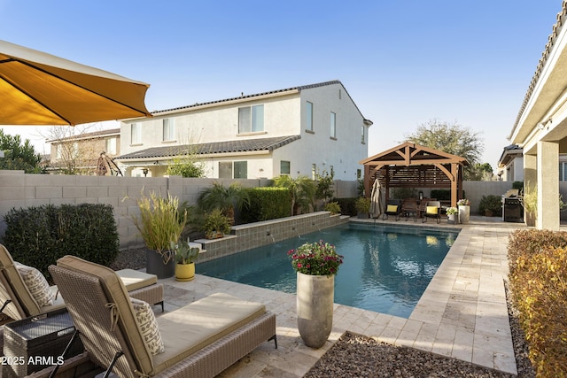 view of swimming pool with a fenced backyard, a fenced in pool, a patio, and a gazebo