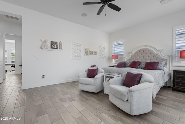 17385 W Sugar Hill Ct, Surprise, AZ 85388 - bedroom featuring wood finished floors, baseboards, and ceiling fan