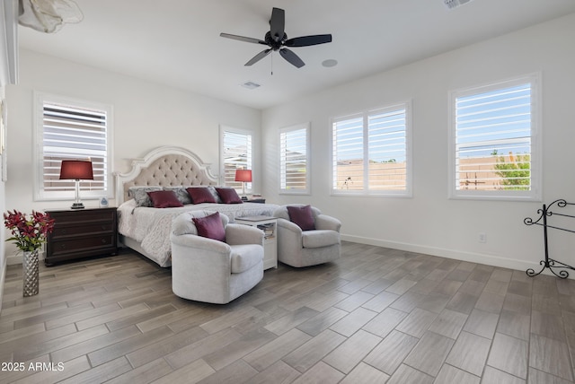 17385 W Sugar Hill Ct, Surprise, AZ 85388 - bedroom with light wood-style floors, baseboards, and ceiling fan