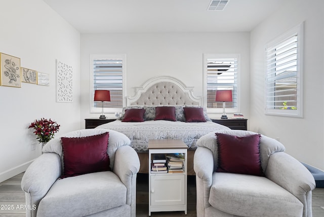 17385 W Sugar Hill Ct, Surprise, AZ 85388 - bedroom featuring wood finished floors and baseboards
