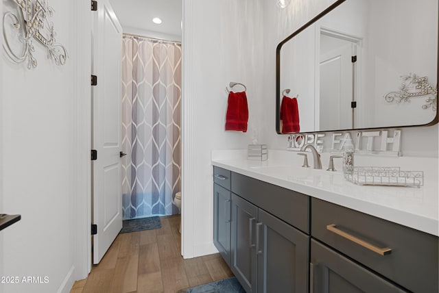 17385 W Sugar Hill Ct, Surprise, AZ 85388 - bathroom with toilet, vanity, recessed lighting, baseboards, and curtained shower
