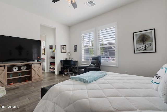 17385 W Sugar Hill Ct, Surprise, AZ 85388 - bedroom with wood finished floors and a ceiling fan