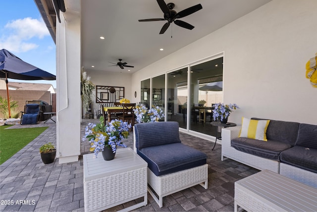 17385 W Sugar Hill Ct, Surprise, AZ 85388 - view of patio / terrace featuring ceiling fan, an outdoor living space, and outdoor dining space