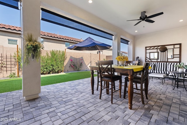 17385 W Sugar Hill Ct, Surprise, AZ 85388 - view of patio / terrace featuring outdoor dining space and ceiling fan