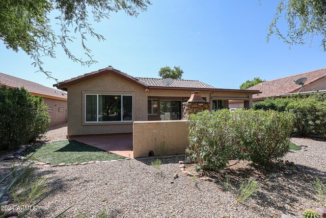 rear view of house with a patio area