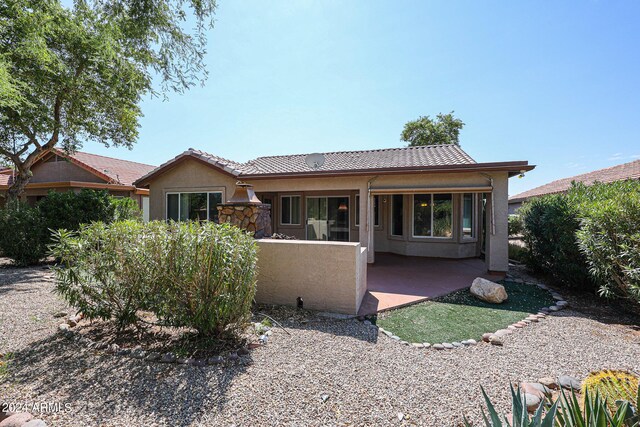 back of house featuring a patio