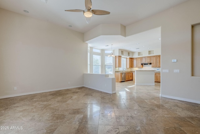 unfurnished living room featuring visible vents, stone tile flooring, baseboards, recessed lighting, and ceiling fan with notable chandelier