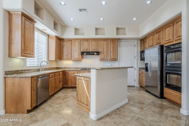 kitchen featuring a sink, recessed lighting, a kitchen island, visible vents, and black appliances