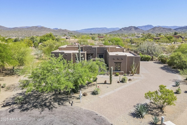 exterior space featuring a mountain view
