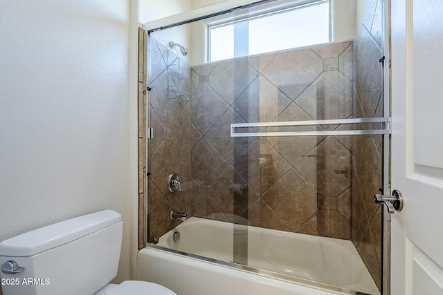 full bath with bath / shower combo with glass door and toilet