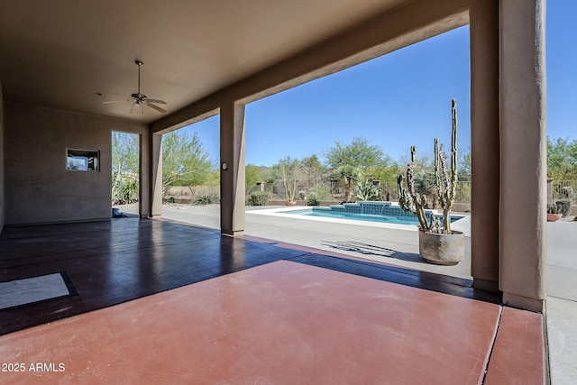 view of patio with ceiling fan and an outdoor pool