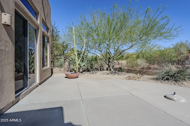 view of patio / terrace with fence
