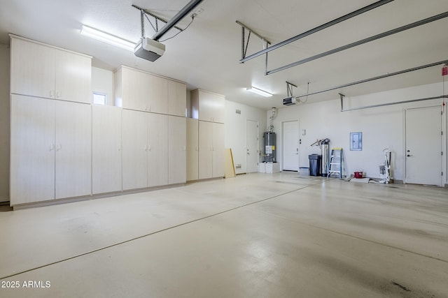 garage featuring a garage door opener, water heater, and electric panel