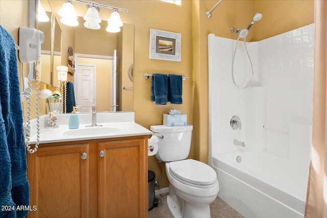 full bathroom featuring tile patterned flooring, shower / bath combination, vanity, and toilet