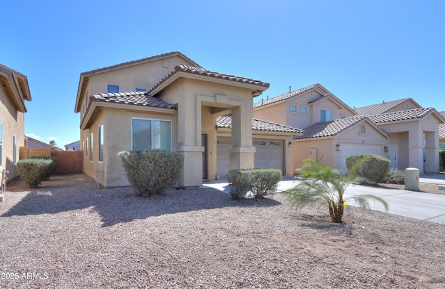 view of front of house with a garage, fence, concrete driveway, and stucco siding