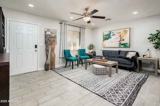 living room featuring ceiling fan