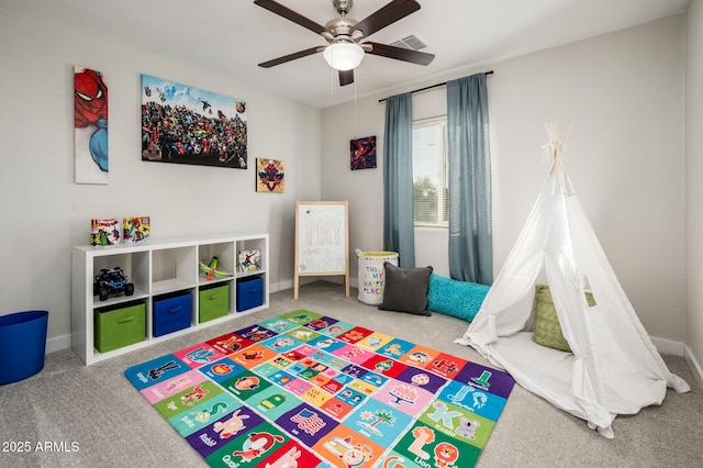 rec room featuring carpet flooring and ceiling fan