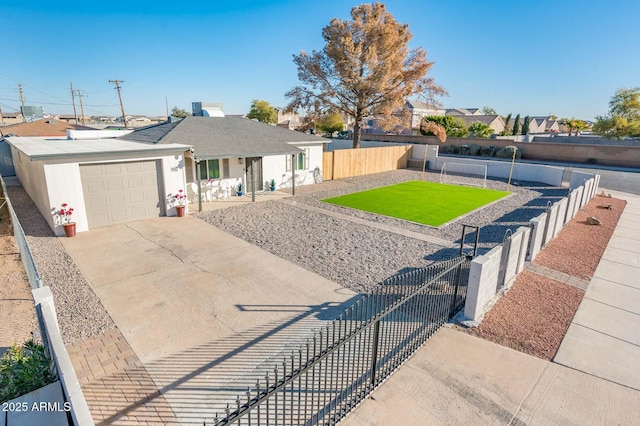 ranch-style house featuring a garage