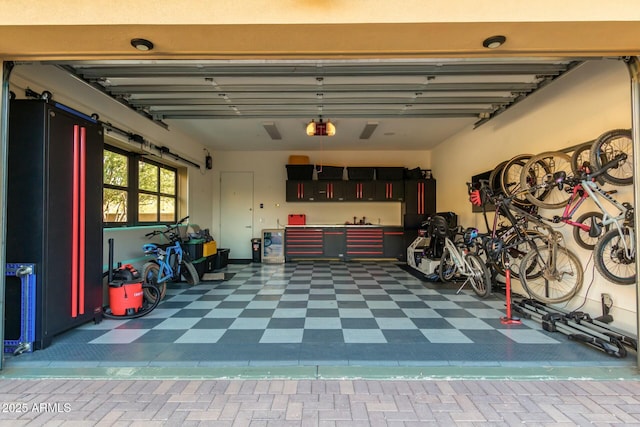 garage featuring a garage door opener