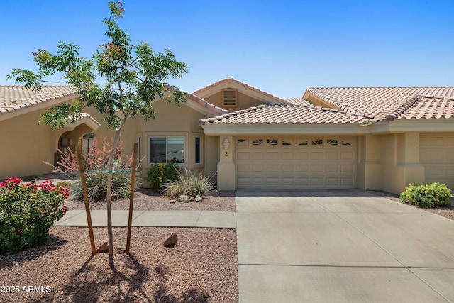 5830 E Mckellips Rd Unit 2, Mesa, AZ 85215 - view of front of property featuring an attached garage, stucco siding, driveway, and a tile roof