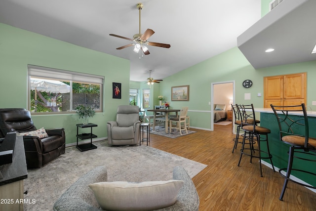 5830 E Mckellips Rd Unit 2, Mesa, AZ 85215 - living room featuring ceiling fan, light wood-type flooring, baseboards, and lofted ceiling