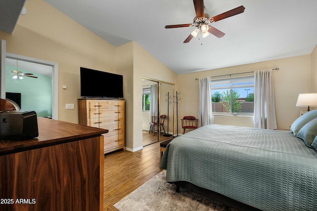 5830 E Mckellips Rd Unit 2, Mesa, AZ 85215 - bedroom featuring vaulted ceiling, wood finished floors, a closet, and ceiling fan