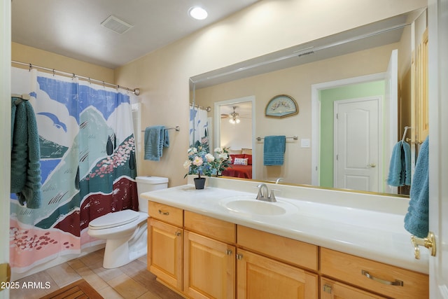 5830 E Mckellips Rd Unit 2, Mesa, AZ 85215 - bathroom with toilet, vanity, and a shower with shower curtain