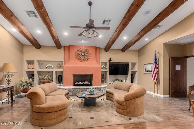5830 E Mckellips Rd Unit 2, Mesa, AZ 85215 - living area featuring baseboards, wood finished floors, beam ceiling, a ceiling fan, and recessed lighting