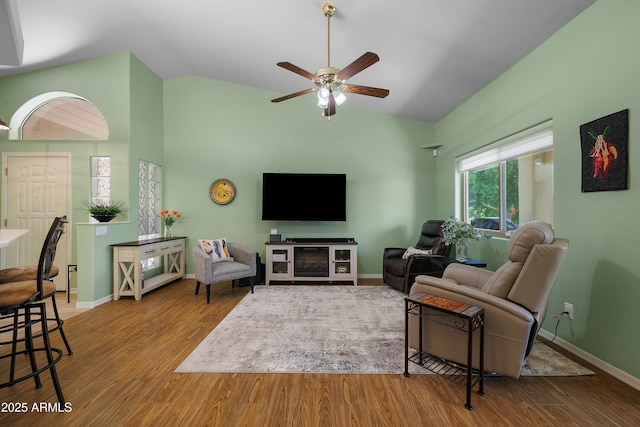 5830 E Mckellips Rd Unit 2, Mesa, AZ 85215 - living area with ceiling fan, wood finished floors, high vaulted ceiling, and baseboards