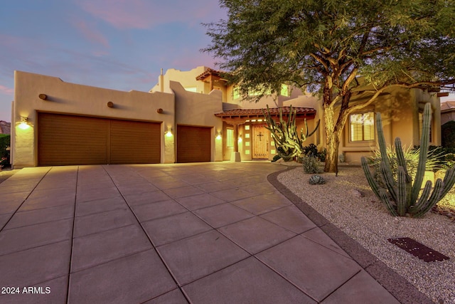 adobe home with a garage