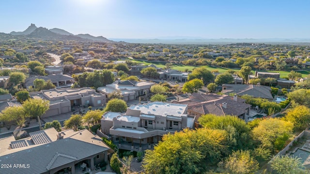 birds eye view of property with a mountain view