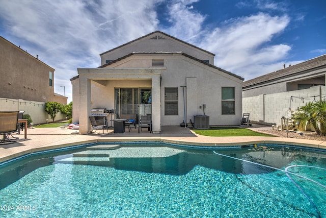 view of pool featuring a fenced in pool, central AC unit, a fenced backyard, and a patio area