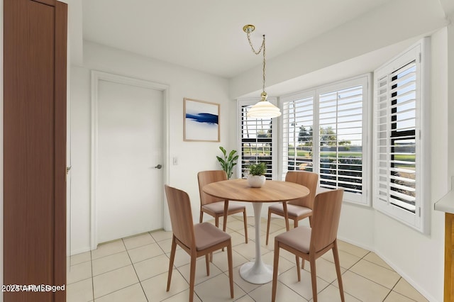 dining room featuring light tile patterned flooring